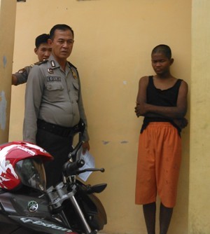 Andi saat diamankan di Polres Merangin